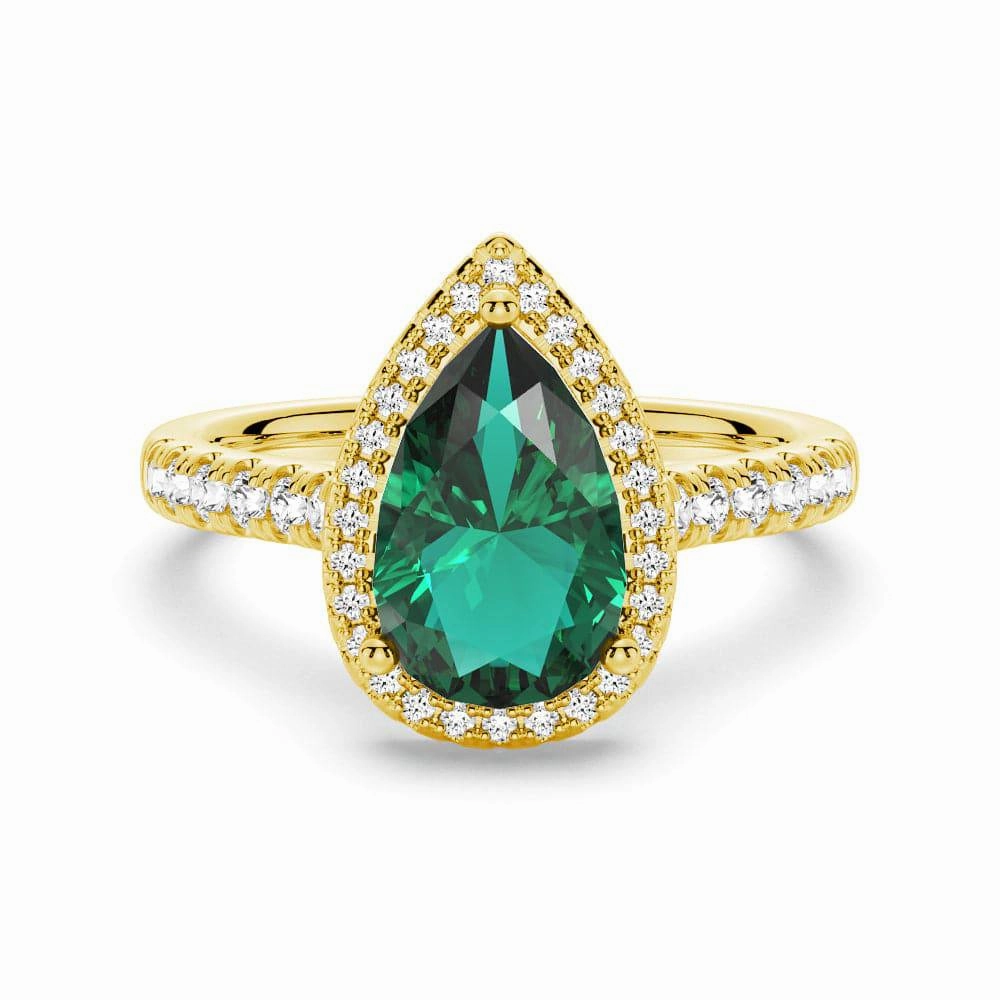 Layered Spark Chic Detail 1.5 CT. Pear Shaped Emerald Ring with White Sapphire Halo Accents