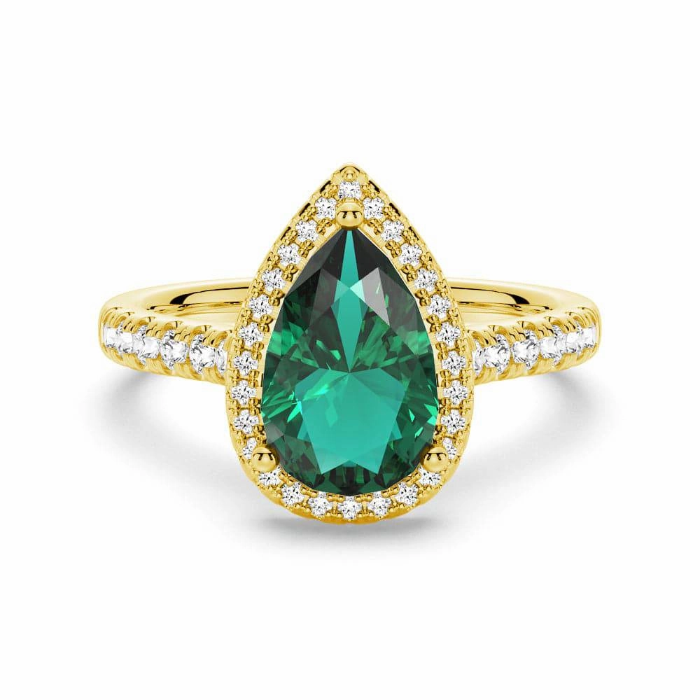 1.5 CT. Pear Shaped Emerald Ring with White Sapphire Halo Accents Luxe Lookbook