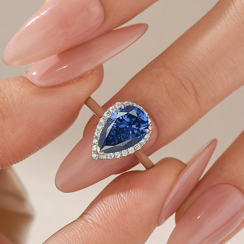 2.2Ct Halo Pear Cut Blue Stone Engagement Ring In Sterling Silver Triangular Pattern Perfect Present