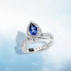 "ENDLESS BLUE" Luxe Crown Pear Shaped Sapphire Ring Precious Appeal Shimmering Accent