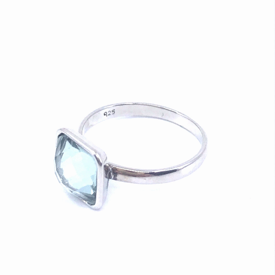 Timeless Line Rhodium Plated Sterling Silver Light Blue Stone Ring