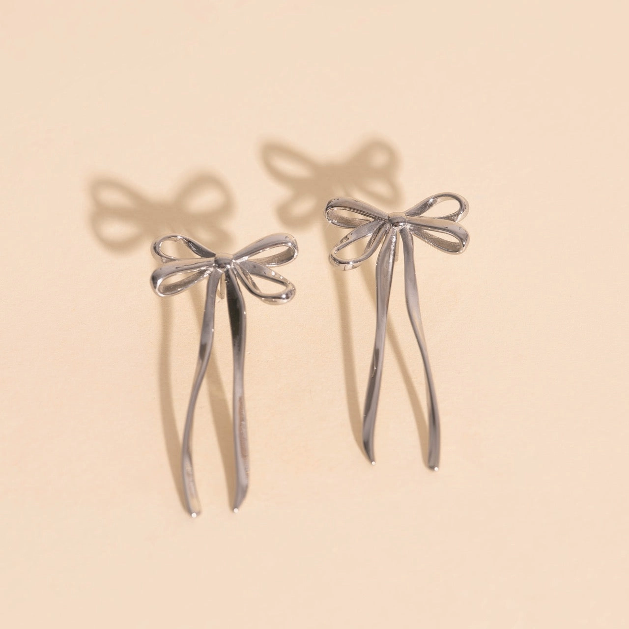 Classic Feature Polished Edge Bowknot Stud Earrings