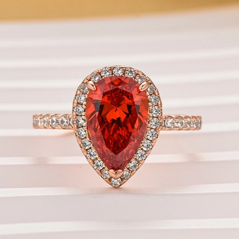 2.2 Carat Simulated Diamond Pear Cut Red Stone Halo Engagement Ring Modern Motion Fashion Pop