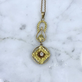 Dazzling Finish 1930s Diamond Pendant in 10K Yellow Gold Filigree. Drop Pendant with Art Nouveau Style.