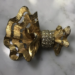 Minimal Piece Elite Finish Vintage Hattie Carnegie Brooch. Asymmetrical Bow quite a statement piece. Possible Necklace?