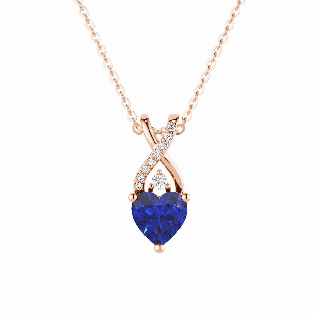 Custom Craftwork 1.16 CT. Solitaire Heart Sapphire and White Sapphire Pendant