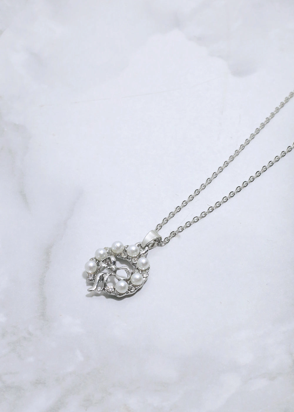 Structured Accent Smooth Accent Pearl & Rhinestone Bow Necklace