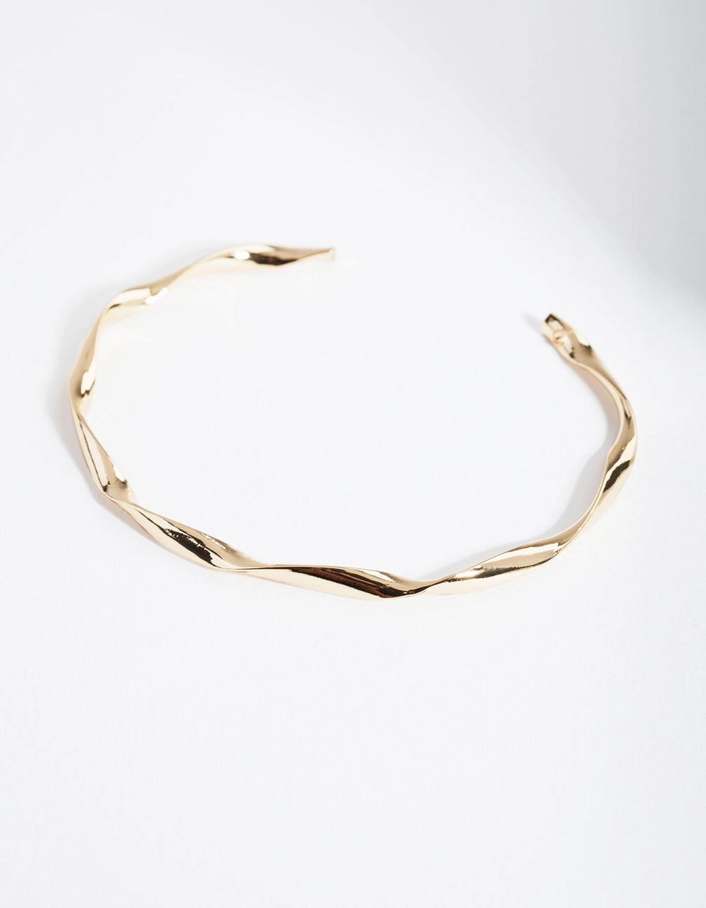 Unwavering Fusions Gold Plated Twist Bangle