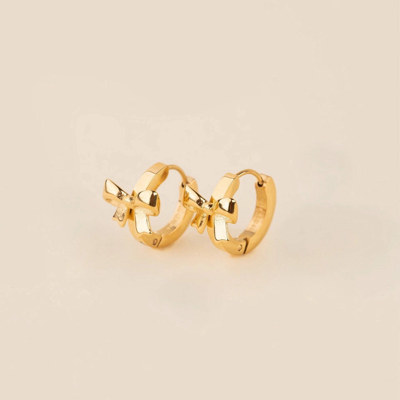Bow 3D Huggie Hoop Earrings Polished Surface