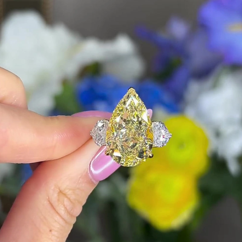 Ornate Memento Louily Stunning Pear Cut Sapphire Three Stone Engagement Ring