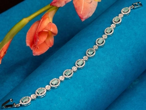 Delicate Finish Ovo charm setter wristlet