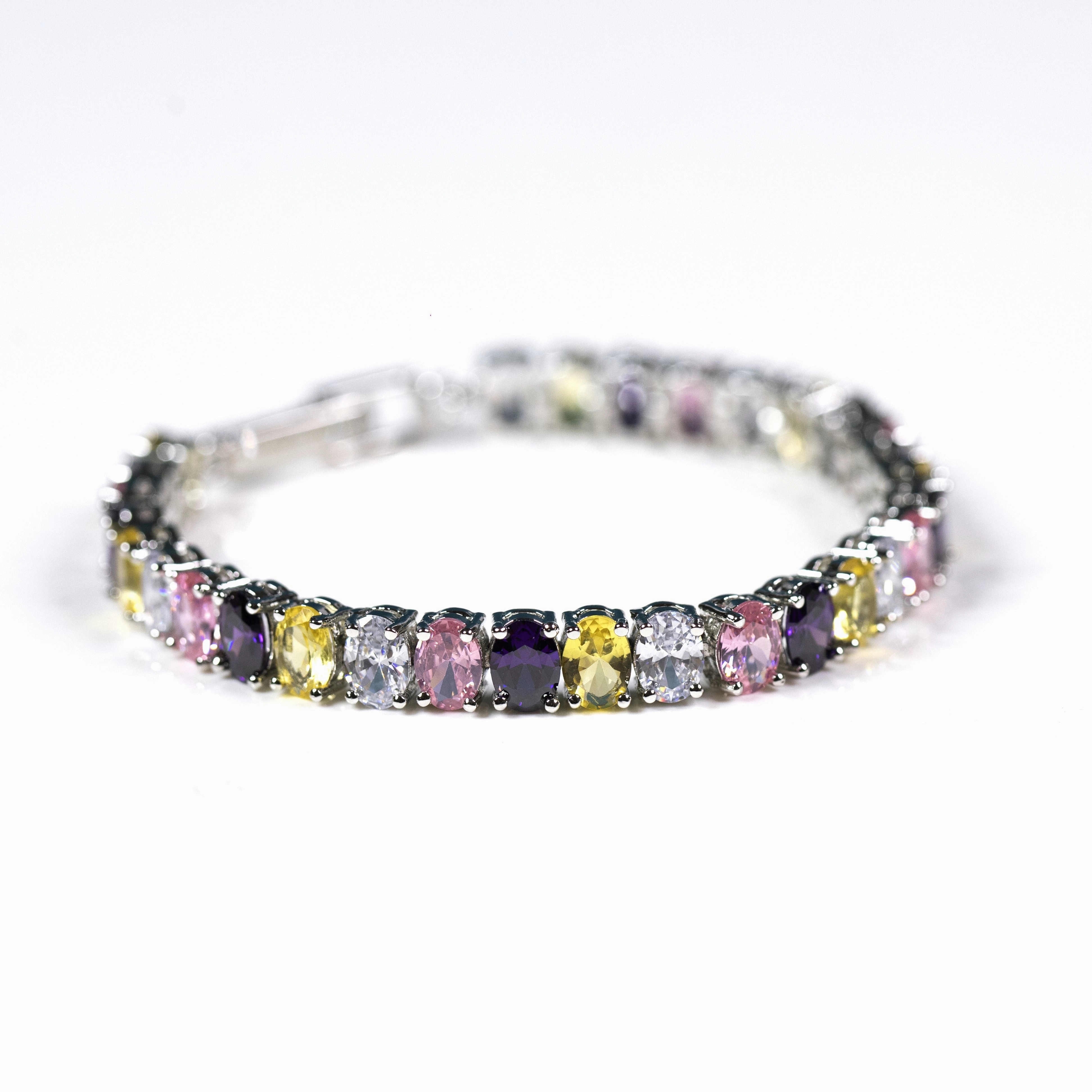 Comprehensive Amalgamations Ovo charm tennis bracelet