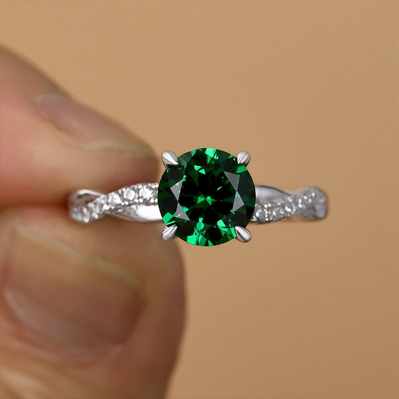Daytime Style Louily Twist Round Cut Emerald Green Engagement Ring In Sterling Silver