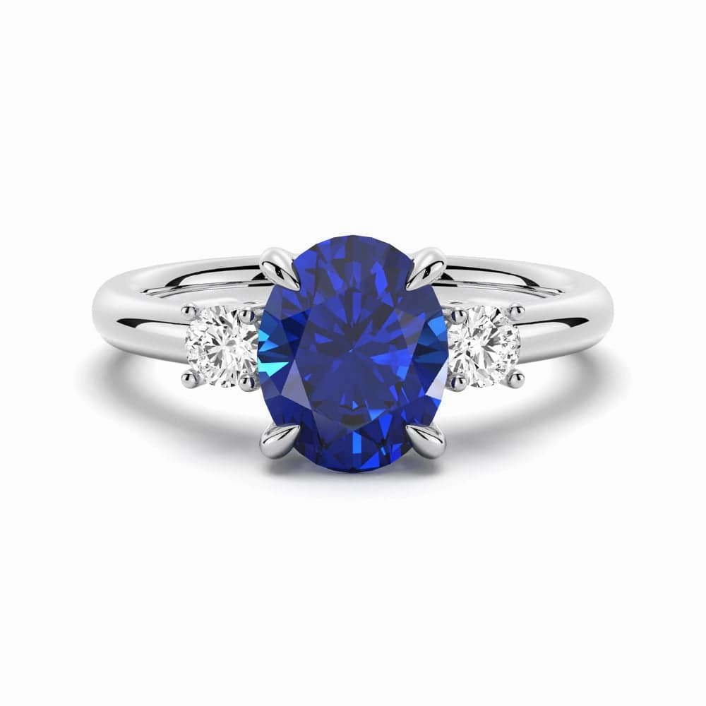 Everyday Fashion 2 CT. Oval Blue Sapphire and White Sapphire Three Stone Ring