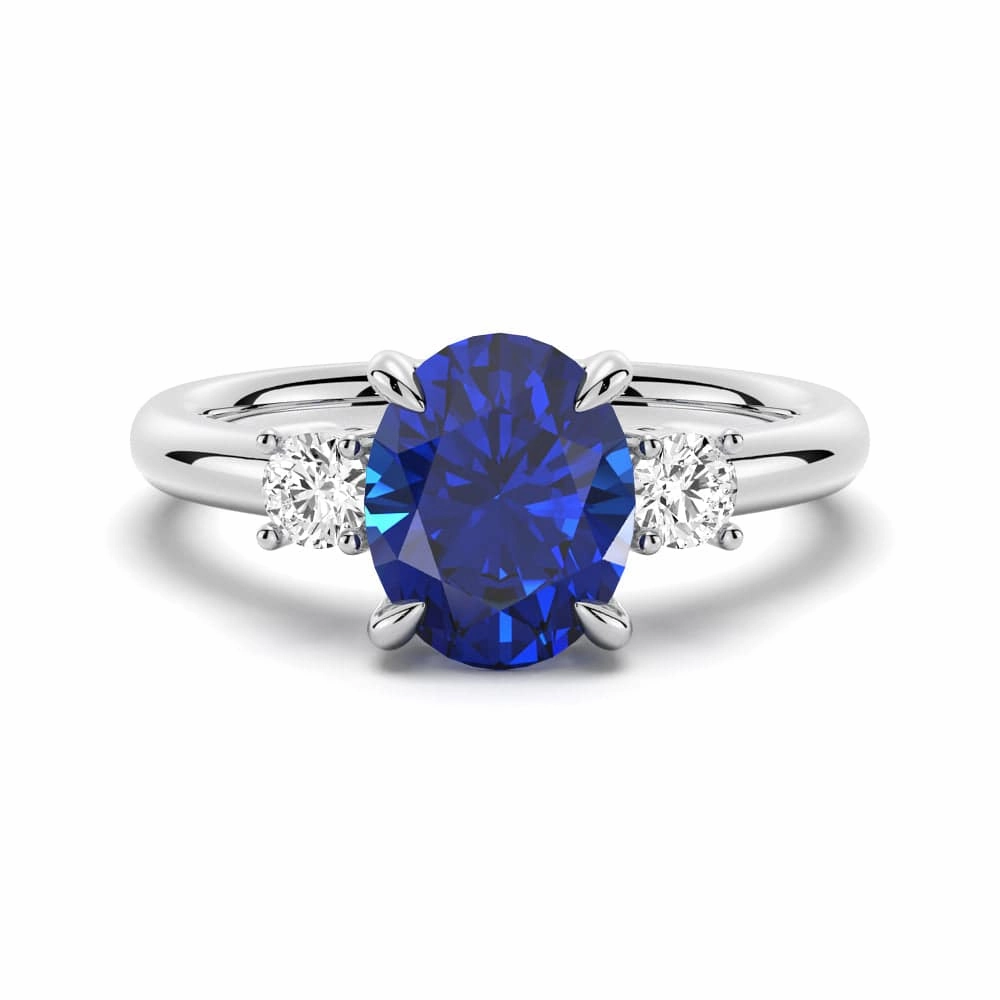 Fashionable Shine Sparkle Mood 2 CT. Oval Blue Sapphire and White Sapphire Three Stone Ring