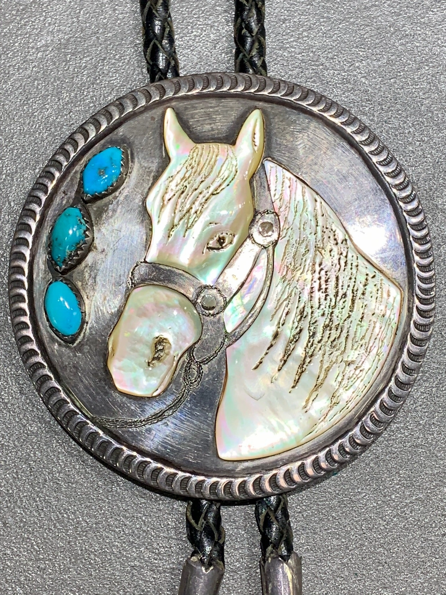 Sleek Edge understated look VINTAGE NATIVE AMERICAN HORSE BOLO STERLING SILVER