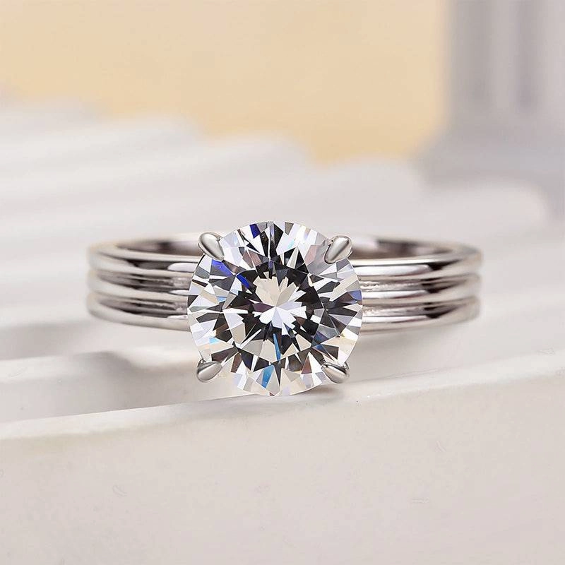 Gentle Simplicity Louily Exclusive Three Shank Round Cut Engagement Ring