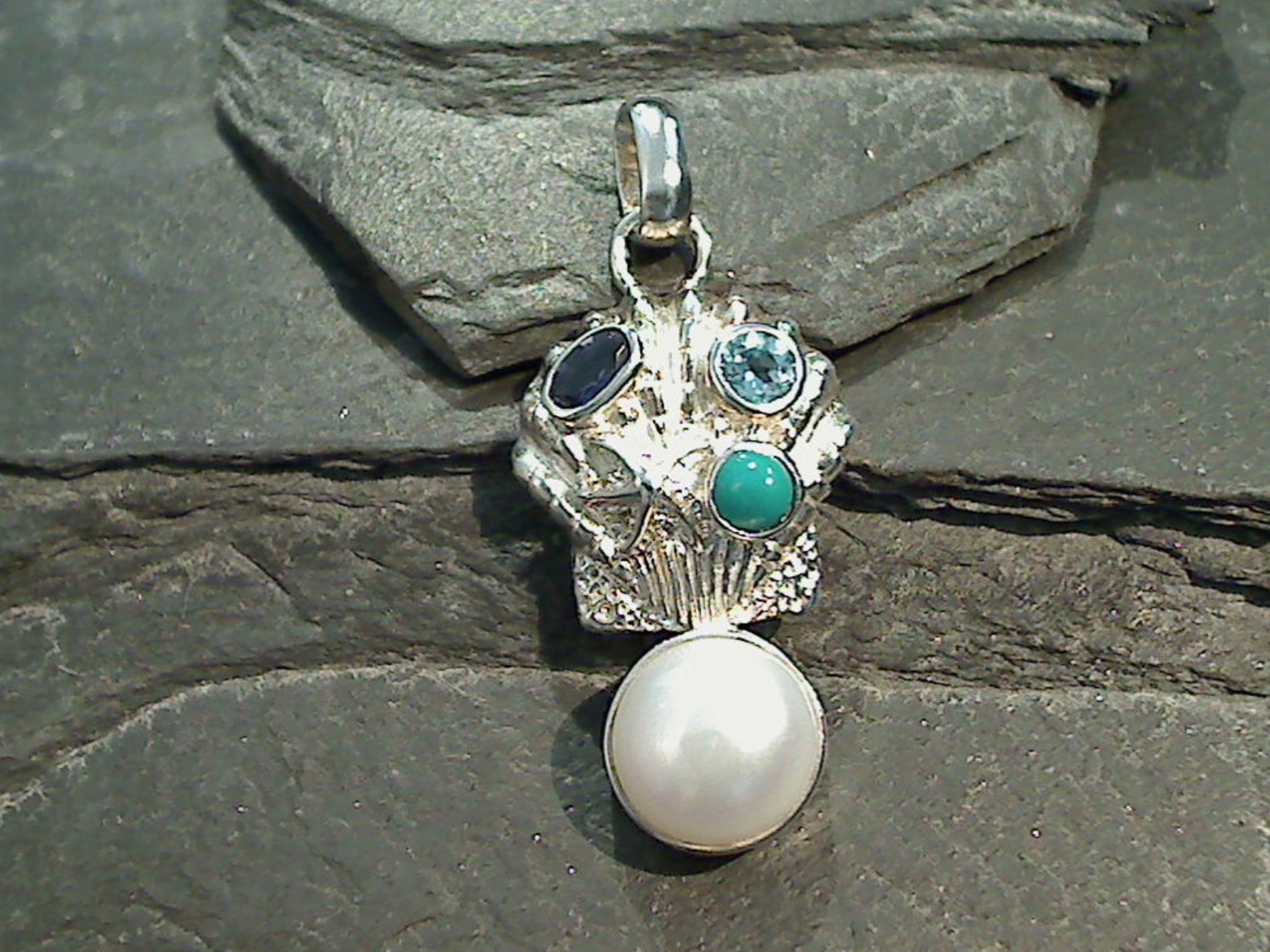 Turquoise, Blue Topaz, Iolite, Pearl, Sterling Silver Pendant Striking Detail Candid Shot