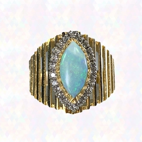 1970s Opal and Diamond Halo Statement Ring in a Large 14K Yellow Gold Setting. Shine Effect Sleek Texture